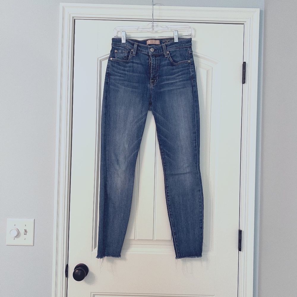 Seven for all Mankind denim.  Size 28.  High waist ankle skinny. Raw hem.